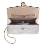 Serpenti Forever small crossbody bag in silver Molten lizard skin with foggy opal gray nappa leather lining. Captivating snakehead magnetic closure in light gold-plated brass embellished with black enamel and light gold-plated brass scales, and black onyx eyes. 293341 image 4