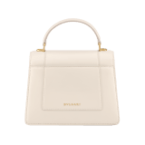 Serpenti Forever medium top handle bag in emerald green calf leather with black nappa leather lining. Captivating snakehead magnetic closure in light gold-plated brass embellished with deep jade intense green enamel and light gold-plated brass scales, and black onyx eyes. SEA-1282-CL image 2