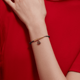 "Diva's Dream" bracelet in ruby red fabric with a gold-plated brass plate. Distinctive Diva charm in gold-plated brass enamelled in ruby red. DIVAMINISTRINGb image 2