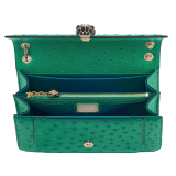 Serpenti Forever medium shoulder bag in vivid emerald green shiny ostrich skin with emerald green nappa leather lining. Captivating snakehead magnetic closure in light gold-plated brass embellished with black enamel and light gold-plated brass scales and black onyx eyes. 293263 image 4