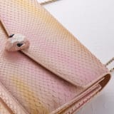 Serpenti Forever medium shoulder bag in pyrite Decò gold python skin with crystal rose nappa leather lining. Captivating snakehead magnetic closure in light gold-plated brass embellished with caramel topaz beige and white mother-of-pearl enamel scales, and black onyx eyes. 292077 image 6