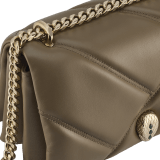 Serpenti Cabochon small shoulder bag in Roman granite brown soft calf leather with a maxi matelassé pattern and emerald green nappa leather lining. The bag features a captivating magnetic snakehead closure in light gold-plated brass embellished with gray mother-of-pearl scales, red enamel eyes and transformable chain strap. 1295-MSM image 5