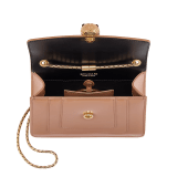 “Serpenti Forever” crossbody bag in agate-white calfskin with a polished, pearly finish and black grosgrain inner lining. Alluring snakehead closure in light gold-plated brass enriched with black and pearly, agate-white enamel and black onyx eyes 422-VCL image 4