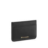 Serpenti Cabochon card holder in black calf leather with maxi matelassé pattern. Captivating snakehead rivet in gold-plated brass embellished with red enamel eyes. SCB-CCHOLDER image 3