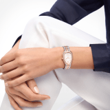 Serpenti Seduttori automatic watch in 18 kt rose gold and stainless steel with diamond-set bezel and white opaline dial. Water-resistant up to 30 metres 104058 image 1