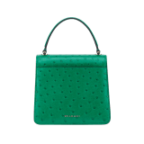 Serpenti Forever small top handle bag in vivid emerald green shiny ostrich skin with emerald green nappa leather lining. Captivating snakehead magnetic closure in light gold-plated brass embellished with black enamel and light gold-plated brass scales, and black onyx eyes. 293264 image 3