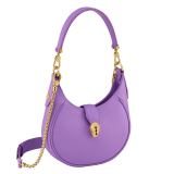 Serpenti Ellipse small crossbody bag in Urban grain and smooth ivory opal calf leather with flamingo quartz pink gros grain lining. Captivating snakehead closure in gold-plated brass embellished with black onyx scales and red enamel eyes. 1204-UCLa image 2