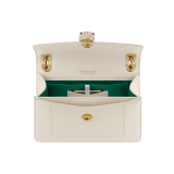 Serpenti Forever Day-to-Night small shoulder bag in emerald green calf leather with black nappa leather lining. Captivating snakehead magnetic closure in light gold-plated brass embellished with deep jade intense green enamel and light gold-plated brass scales, and black onyx eyes. SEA-1281-CL image 3