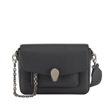 Serpenti Forever small unisex crossbody bag in matt black calf leather with black nappa leather lining and decorative chain. Captivating snakehead closure in dark ruthenium-plated brass embellished with red enamel eyes. 293022 image 1