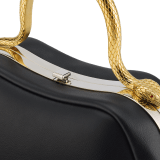 Serpentine mini top handle bag in black smooth calf leather with emerald green nappa leather lining. Captivating snake body-shaped top handle in gold-plated brass embellished with engraved scales and red enamel eyes, press-button closure and light gold-plated brass hardware. SRN-1291 image 5