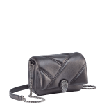 Serpenti Cabochon micro bag in gold calf leather with a maxi matelassé pattern and black nappa leather lining. Captivating snakehead closure in light gold-plated brass embellished with red enamel eyes. SCB-NANOCABOCHONb image 1