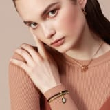 "Serpenti Forever" bracelet in Deep Garnet bordeaux braided calf leather and gold plated brass snake body-shaped chain, with the iconic snakehead charm in black and white agate enamel and black enamel eyes. Magnetic clasp closure. SerpBraidChain-WCL-DG image 2