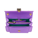 Serpenti Forever small crossbody bag in white agate calf leather with heather amethyst fuchsia grosgrain lining. Captivating snakehead closure in light gold-plated brass embellished with black and white agate enamel scales and green malachite eyes. 1082-CLb image 4