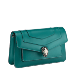 Serpenti Forever East-West small shoulder bag in black calf leather with emerald green grosgrain lining. Captivating snakehead magnetic closure in light gold-plated brass embellished with black and white agate enamel scales, and green malachite eyes. 1237-CLa image 2