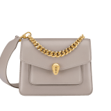 Serpenti Forever Maxi Chain small crossbody bag in foggy opal gray Metropolitan calf leather with linen agate beige nappa leather lining. Captivating snakehead magnetic closure in gold-plated brass embellished with gray agate scales and red enamel eyes. 1134-MCMC image 1
