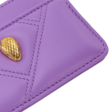 Serpenti Cabochon card holder in sheer amethyst lilac calf leather with a maxi quilted pattern and watercolor opal light blue nappa leather lining. Captivating snakehead rivet in gold-plated brass embellished with red enamel eyes. SCB-CCHOLDERa image 4