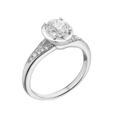 Incontro d’Amore ring in platinum with round brilliant-cut diamond and pavé diamonds. Available from 0.20 ct. As its pavé rows embrace a diamond apex, Incontro d’Amore joins two hearts as one. 352213 image 1