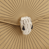 Serpenti Forever top handle bag in ivory opal laser-cut calf leather with caramel topaz beige nappa leather lining. Captivating snakehead closure in light gold-plated brass embellished with matt and shiny ivory opal enamel scales and black onyx eyes. 752-LCL image 5