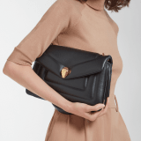 Serpenti Reverse medium shoulder bag in Sahara amber light brown quilted Metropolitan calf leather with taffy quartz pink nappa leather lining. Captivating snakehead magnetic closure in gold-plated brass embellished with red enamel eyes. 1223-MCL image 7