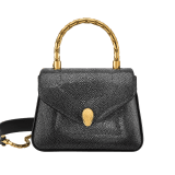 Serpenti Reverse small top handle bag in soft emerald green galuchat skin with amethyst purple nappa leather lining. Captivating magnetic snakehead closure in light gold-plated brass embellished with red enamel eyes. 1234-SG image 5