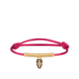 Serpenti Forever bracelet in ruby red fabric. Gold-plated brass tubular element and captivating snakehead charm embellished with black and white agate enamel scales, and black enamel eyes. SERP-MINISTRINGc image 1