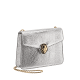 Serpenti Forever small crossbody bag in silver Molten lizard skin with foggy opal gray nappa leather lining. Captivating snakehead magnetic closure in light gold-plated brass embellished with black enamel and light gold-plated brass scales, and black onyx eyes. 293341 image 2