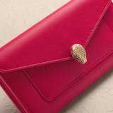 Serpenti Forever large wallet in Niagara sapphire blue calf leather with coral carnelian orange nappa leather interior. Captivating snakehead press button closure in light gold-plated brass finished with red enamel eyes. SEA-6CCWALLET image 6