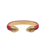 Serpenti Forever bangle bracelet in gold-plated brass with amaranth garnet pure karung inserts. Captivating contraire snakehead motif in gold-plated brass. BRACLT-SP-CONTR-LNY image 1