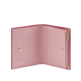 Bulgari Logo compact wallet in primrose quartz pink calf leather with hot-stamped Infinitum pattern all over and anemone spinel pinkish-red nappa leather interior. Light gold-plated brass hardware and press-stud closure. BVL-COMPACTWLTa image 2