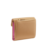 Serpenti Reverse compact wallet in Sahara amber light brown quilted Metropolitan calf leather with taffy quartz pink Metropolitan calf leather interior. Captivating snakehead press button closure in gold-plated brass embellished with red enamel eyes. SRV-COMPACTWLT image 3