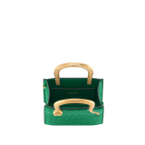 Serpentine mini tote bag in vivid emerald green shiny ostrich skin with vivid emerald green nappa leather lining. Captivating snake body-shaped handles in gold-plated brass embellished with engraved scales and red enamel eyes. 293262 image 4
