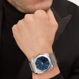 Octo Finissimo Automatic watch with mechanical manufacture movement, automatic winding, platinum micro rotor, small seconds, extra-thin satin-polished stainless steel case and integrated bracelet, transparent case back and blue lacquered dial with sunburst finishing. Water-resistant up to 100 meters. 103431 image 1