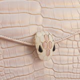 Serpenti Forever small top handle bag in white Moonpearl alligator skin with crystal rose nappa leather lining. Captivating snakehead magnetic closure in light gold-plated brass embellished with white agate enamel and pink quartz scales and black onyx eyes. 293468 image 5