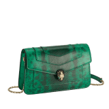 Serpenti Forever chain wallet in vivid emerald shiny karung with black nappa leather interior. Captivating snakehead magnetic closure in light gold-plated brass, embellished with black enamel and light gold-plated brass scales, and malachite eyes. SEA-CHAINPOCHETTEexotic image 1