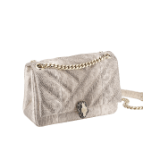 Serpenti Cabochon small shoulder bag in milky opal beige matelassé metallic karung skin with milky opal beige nappa leather lining. Captivating snakehead closure in light gold-plated brass embellished with matte black and glitter milky opal beige enamel scales and black onyx eyes. 1094-MK image 2
