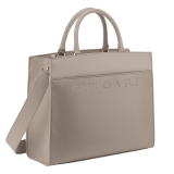 Bulgari Logo medium tote bag in foggy opal grey smooth and grained calf leather with linen agate beige grosgrain lining. Iconic Bulgari logo decorative chain in light gold-plated brass, with hook fastening. 291956 image 2