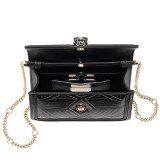 “Serpenti Diamond Blast” shoulder bag in white agate calf leather, featuring a Whispy Chain motif in light gold finishing. Iconic snakehead closure in light gold plated brass enriched with black and white agate enamel and black onyx eyes. 987-WC image 4