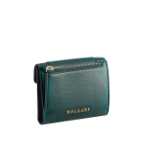 Serpenti Forever compact wallet in shiny midnight plum karung with black nappa leather interior. Captivating snakehead press-button closure in palladium-plated brass embellished with midnight plum enamel and palladium-plated brass scales and black enamel eyes. SEA-SLIM-COMPACT-R-kar image 2