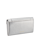 Serpenti Forever large wallet in black calf leather with emerald green nappa leather interior. Captivating snakehead magnetic closure in light gold-plated brass embellished with black enamel and light gold-plated brass scales, and black onyx eyes. SEA-LONG-WLT-R image 3