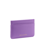 Serpenti Cabochon card holder in sheer amethyst lilac calf leather with a maxi quilted pattern and watercolor opal light blue nappa leather lining. Captivating snakehead rivet in gold-plated brass embellished with red enamel eyes. SCB-CCHOLDERa image 3