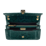Serpenti Forever medium shoulder bag in Forest Emerald green shiny python skin with black nappa leather lining. Captivating snakehead press button closure in gold-plated brass embellished with black enamel scales, and black onyx eyes. 292580 image 4