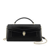 Serpenti Forever Elongated top handle bag in black calf leather with black nappa leather lining. Captivating snakehead magnetic closure in light gold-plated brass embellished with black enamel and light gold-plated brass scales, and black onyx eyes. SEA-001-1390S image 4