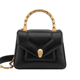 Serpenti Reverse small top handle bag in black quilted Metropolitan calf leather with black nappa leather lining. Captivating snakehead magnetic closure in gold-plated brass embellished with red enamel eyes. 1234-MCL image 6