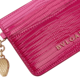Serpenti Forever card holder in beetroot spinel fuchsia dégradé lizard skin. Captivating snakehead charm in light gold-plated brass embellished with red enamel eyes. 292287 image 4