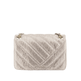 Serpenti Cabochon small shoulder bag in milky opal beige matelassé metallic karung skin with milky opal beige nappa leather lining. Captivating snakehead closure in light gold-plated brass embellished with matt black and glitter milky opal beige enamel scales and black onyx eyes. 1094-MK image 3
