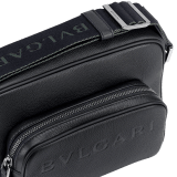 BULGARI Man small camera bag in black smooth and grainy metal-free calf leather with Olympian sapphire blue regenerated nylon (ECONYL®) lining. Dark ruthenium-plated brass hardware, hot stamped BULGARI logo and zipped closure. BMA-1206-CL image 4