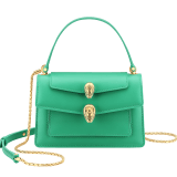 Alexander Wang x Bulgari small belt bag in spring peridot green calf leather with black nappa leather lining. Captivating double Serpenti head closure in antique gold-plated brass embellished with red enamel eyes. 291888 image 1