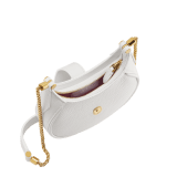 Serpenti Ellipse micro bag in soft, drummed, flash diamond white calf leather with taffy quartz pink grosgrain lining. Captivating snakehead closure in gold-plated brass embellished with mother-of-pearl scales and red enamel eyes, leather tab with magnet, and zipped fastening. SEA-MICROHOBOc image 2