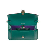 Serpenti Forever East-West small shoulder bag in black calf leather with emerald green gros grain lining. Captivating snakehead magnetic closure in light gold-plated brass embellished with black and white agate enamel scales, and green malachite eyes. 1237-CL image 4