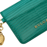 Serpenti Forever card holder in emerald green dégradé lizard skin. Captivating snakehead charm in light gold-plated brass embellished with red enamel eyes. 292601 image 4
